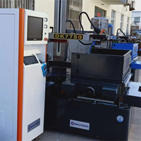 Machine de découpe de fil CNC de haute précision et de bonne qualité DK7750 EDM, machine de découpe de fil CNC EDM pour la découpe d'objets de travail