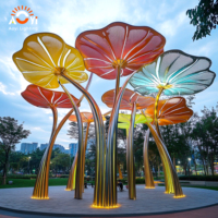 Sculpture géante personnalisée en métal en forme de feuille de lotus, lumineuse et durable, pour l'aménagement paysager extérieur de Noël, idéale pour les places municipales et les sites touristiques.