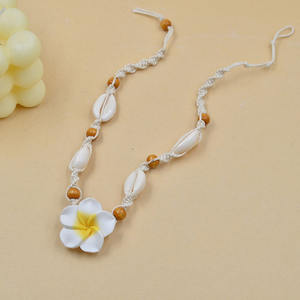 Nouveau design naturel coquille de mer cauri tissé tour de cou mode Hawaii plage Plumeria fleurs perles de bois tressé déclaration collier - Product Image 6