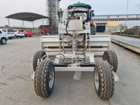 Niveleuse de terrain tractée par tracteur PWBQ400 140HP avec niveleuse hydraulique assortie et support de roue oscillante