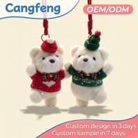Venta al por mayor de fábrica: Pareja de osos de peluche blancos de Navidad con gorro de punto, suéter y pajarita, regalo personalizado OEM para las fiestas.