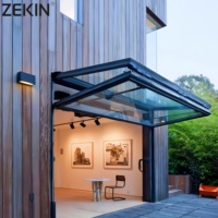 Fenêtre pliante verticale en verre double vitrage de conception nouvelle avec grille intérieure, fenêtres pliantes en aluminium noir