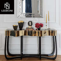 Console de meubles de salon à armature en métal noir et or durable en acier inoxydable au design de luxe