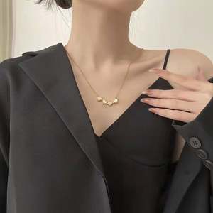 Collier en acier inoxydable créatif en forme de cœur à double usage, trèfle à quatre feuilles magnétique, zircone plaqué or 18 carats, 20 pouces - Product Image 6