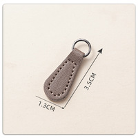 Extracteur personnalisé PU cuir étiquette sac extracteur de vêtements fermeture éclair tirer queue bagages accessoires divers styles