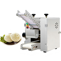 Machine à empanadas et à tortillas de qualité commerciale avec une construction en acier inoxydable durable.