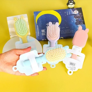 Cepillo de masaje para el cuero cabelludo Mohei, peine con cojín, 15-20 cm, con forma de oreja, portátil, para niños - Product Image 1