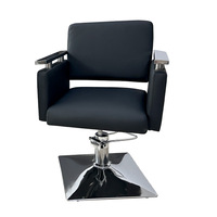 Fauteuil de barbier en cuir inclinable et rotatif réglable avec design pliable et repose-pieds pour salon de coiffure et institut de beauté
