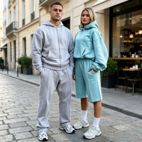 Ensemble de survêtement unisexe Kuest personnalisé gris avec sweat à capuche zippé oversize et pantalon de jogging long, idéal pour l'hiver et les loisirs