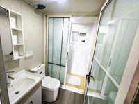 Maison conteneur extensible de luxe moderne de 20 pieds et 40 pieds avec salle de bain complète, mur de verre préfabriqué, prix raisonnable, en acier pour usage en boutique
