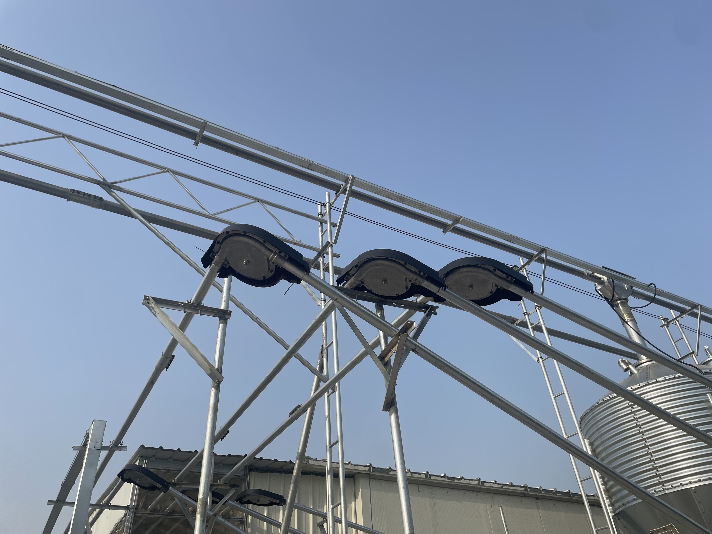livestock feed distribution drop outlets