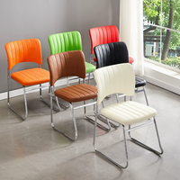 Chaise empilable de banquet d'hôtel à dossier ouvert, rembourrée en cuir PU de luxe, avec cadre en métal moderne, best-seller