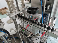 Machine de remplissage et de bouchage monobloc, machine de tri automatique des bouchons, machine de remplissage de liquides pour flacons en verre de teinture et de collyre