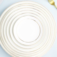 Assiettes à steak rondes en céramique avec bord doré de qualité supérieure, vaisselle plate peu profonde créative