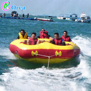Vente en gros de jeux sportifs amusants pour parcs aquatiques en plein air, bateau gonflable en forme de beignet, bateau disco gonflable, meilleure qualité, PVC 0,9 mm - Product Image 1