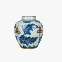 Pot à couvercle bleu et blanc à feuilles rouges