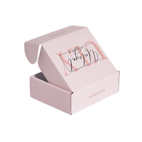 Cajas de Cartón Corrugado Ecológicas Rosadas para Envío, Plegables, con Diseño de Logotipo en Lámina Dorada