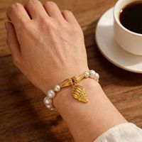 Bracelet élastique en perles de coquillages plaqué or en acier inoxydable style plage d'été DAIHE