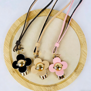 Cartoon Zinc Alloy Figurine Leather Keychain Renowned Brand Doll Four-Leaf Clover Leather Accessory