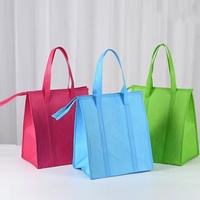 Sac isotherme réutilisable en non-tissé orange avec fermeture éclair et motif lettres pour livraison de repas, gâteaux et jus – Garde au chaud ou au frais