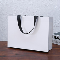 Sacs en papier d'emballage de vêtements de luxe colorés avec poignée en ruban, réutilisables, personnalisés, pour bougies, impression par laminage