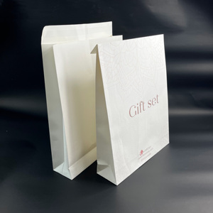 ถุงกระดาษคราฟท์สีขาวพิมพ์โลโก้เต็มใบตามสั่ง - ถุงใส่ของขวัญแบบด้าน ถุงบรรจุภัณฑ์ของขวัญ ถุงกระดาษคราฟท์สำหรับส่งของ - Product Image 3