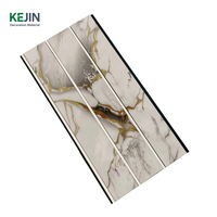 Panneau de plafond décoratif suspendu en PVC à languette et rainure Plafond à texture de marbre en plastique multiple