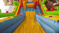 Structure gonflable combinée toboggan et château de jeu vidéo à thème de personnage de dessin animé, avec souffleur, garantie 3 ans, en PVC coloré, pour enfants, pour jardin