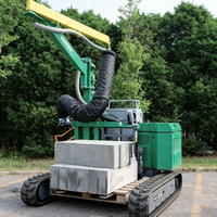 Machine de pavage automotrice sur chenilles pour dalles de béton et pierres naturelles, avec aspirateur et élévateur à palettes intégrés