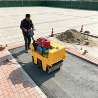Rouleau vibratoire portatif manuel pour le compactage de l'asphalte, idéal pour les travaux d'aménagement paysager, avec une longue durée de vie et une qualité supérieure