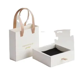 Caja de joyería de lujo con logotipo impreso personalizado, cajonera portátil de cartón, caja de regalo, pequeña