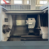 Articles d'occasion de précision ultra-élevée, tour CNC Okuma L390E pour le tournage de pièces d'arbre de moyenne taille et de haute précision.