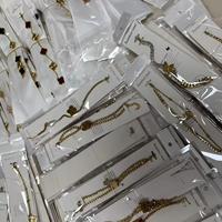 Bracelet Trèfle Designer en Acier Inoxydable Plaqué Or 18 carats et Collier Cœur Cubain de Luxe avec Lettre CC – Vente en Gros
