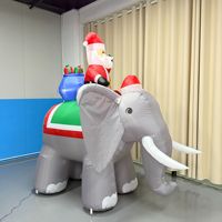 Figurine gonflable de Noël pour décoration de jardin extérieur : Vieil homme montant sur un éléphant – Idéale pour les expositions commerciales internationales