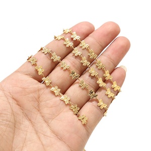 दीना ग्रीष्मकालीन प्रवृत्ति वाटरप्रूफ बिकनी गहने शरीर श्रृंखला स्टेनलेस स्टील गहने धनुष तितली आकर्षण महिलाओं के लिए - Product Image 1