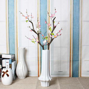 Branches de fleurs artificielles de prunier d'hiver en soie, haute simulation, pour décoration de mariage, design à 4 branches - Product Image 1