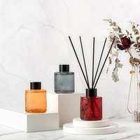 Diffuseur de roseaux haut de gamme personnalisé ambre 200ml diffuseur d'huile essentielle naturelle dans une bouteille en verre diffuseur de roseaux avec bâton