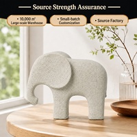 Figurine d'éléphant en résine ivoire avec texture de grès, petite sculpture minimaliste pour la décoration du salon et du bureau