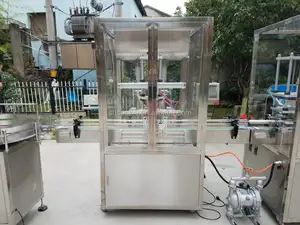 Tappatrice per imbottitura di bottiglie di pasta liquida completamente automatica