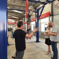 Bras robotisé articulé personnalisé pour treillis, portée de travail 300x300x300mm, capacité 1000kg pour chargement/déchargement automatique