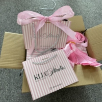 Sacs cadeaux personnalisés de haute qualité en papier avec votre propre logo pour l'emballage d'accessoires de mode