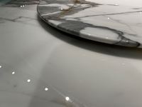 Pieds de table ronds en acier inoxydable de luxe haut de gamme, table à manger minimaliste en dalle de marbre avec surface miroir, table ronde