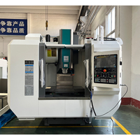 Centre d'usinage vertical CNC 3 axes Tour CNC Fraiseuse Automatique Prix VMC
