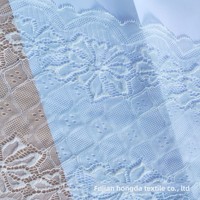 Celana Dalam Berpola Berlian Bahan Renda Elastis Tinggi Pakaian Tidur Lingerie ODM Nilon Filamen Dobby Rajutan Warp Knitting