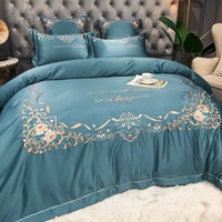 Parure de lit de luxe en coton doux et soyeux avec motif floral brodé bleu