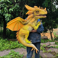 Main mignonne contrôle bébé réaliste t-rex animatronique dragon marionnette
