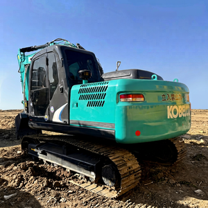 Excavatrice sur chenilles Kobelco SK140 couleur turquoise avec godet de 0,57 m³ de capacité, poids opérationnel de 14 tonnes, machine d'occasion - Product Image 1