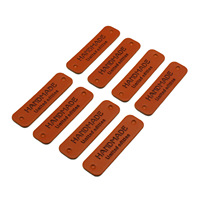 Étiquette en cuir personnalisée en gros, patch en cuir avec logo en relief pour accessoires vestimentaires