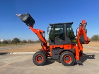 Chargeuse-pelleteuse professionnelle 4x4 robuste avec godet de chargement frontal et bras d'excavation arrière
