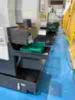 Tour CNC de type suisse à double broche ST-203 avec système Fanuc, machine combinée de tournage et de fraisage avec chargeur automatique de barres pour le métal